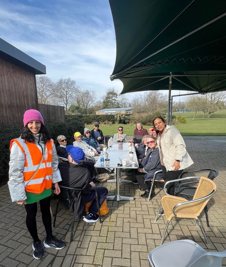 aruna and walkers enjoying a social drink after their walk
